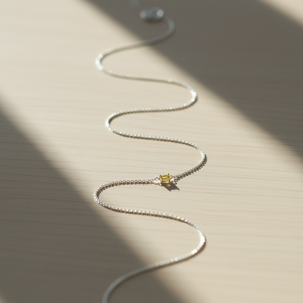 Necklace on wooden surface